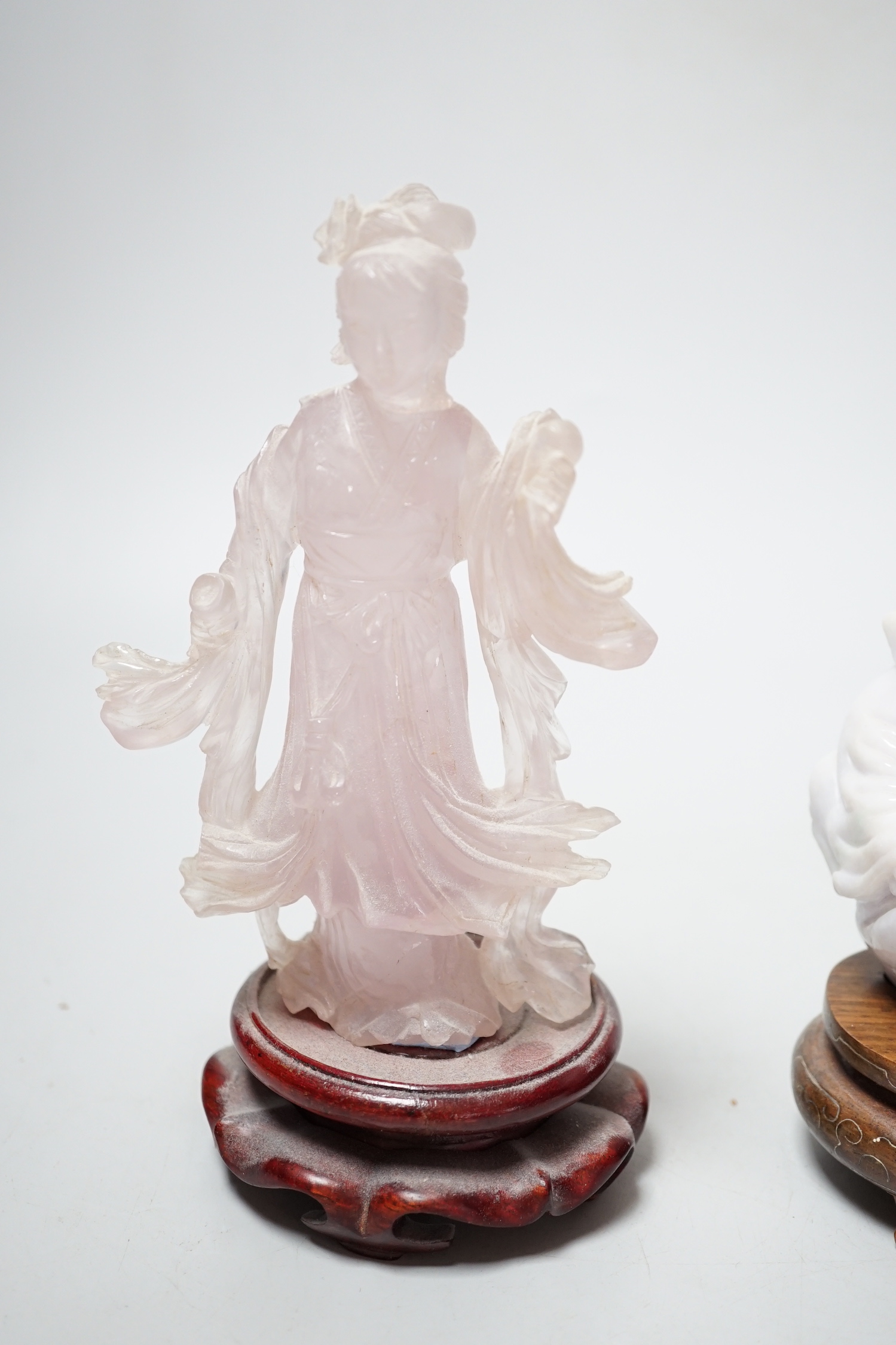 A Chinese jadeite figure of Budai, 11cm high and a rose quartz figure of a lady, wood stands